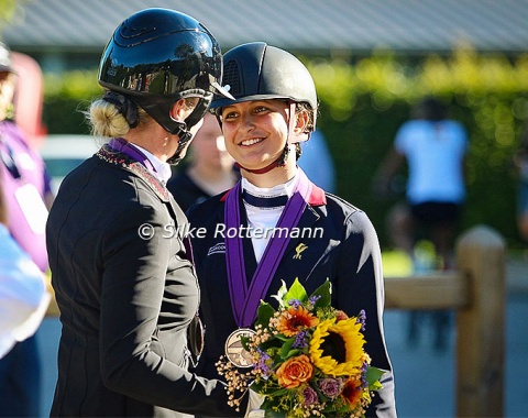 Bronze medal winner Melanie Wienand congratulating France’s Chiara Zenati to silver.