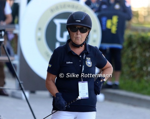 Swedish Louise Etzner Jakobsson watching her horse Goldstrike on the jogging strip during the horse-inspection.