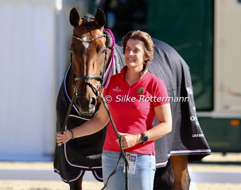 Wendy Laeremans, sport director of the Belgian Equestrian Federation and co-owner of Best Of 8, the horse she's holding for Michele George