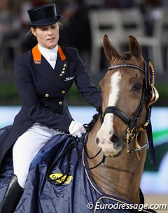 Adelinde Cornelissen rides Galahad in the prize giving for the Grand Prix at the 2011 CDI-W Mechelen. Galahad used to be named Molenkoning's Travers and is by Jazz x Blanc Rivage xx
